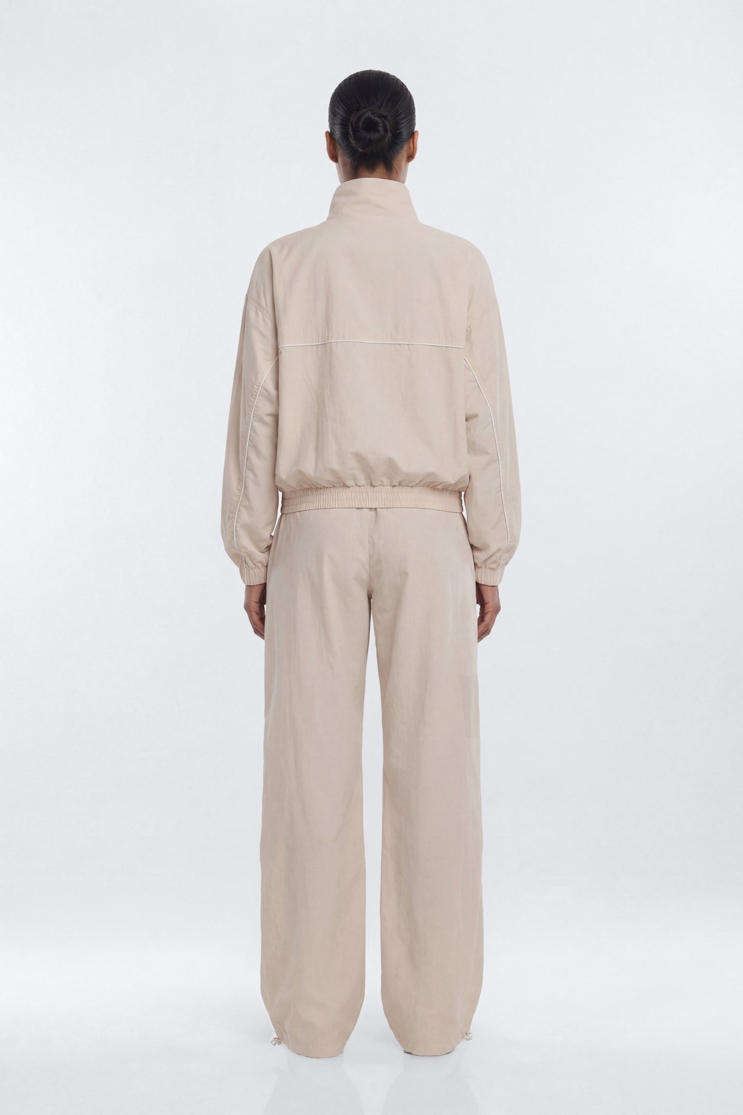 CoreNylon 32″ Pocket Track Pant - Oat Milk Fashion Nova