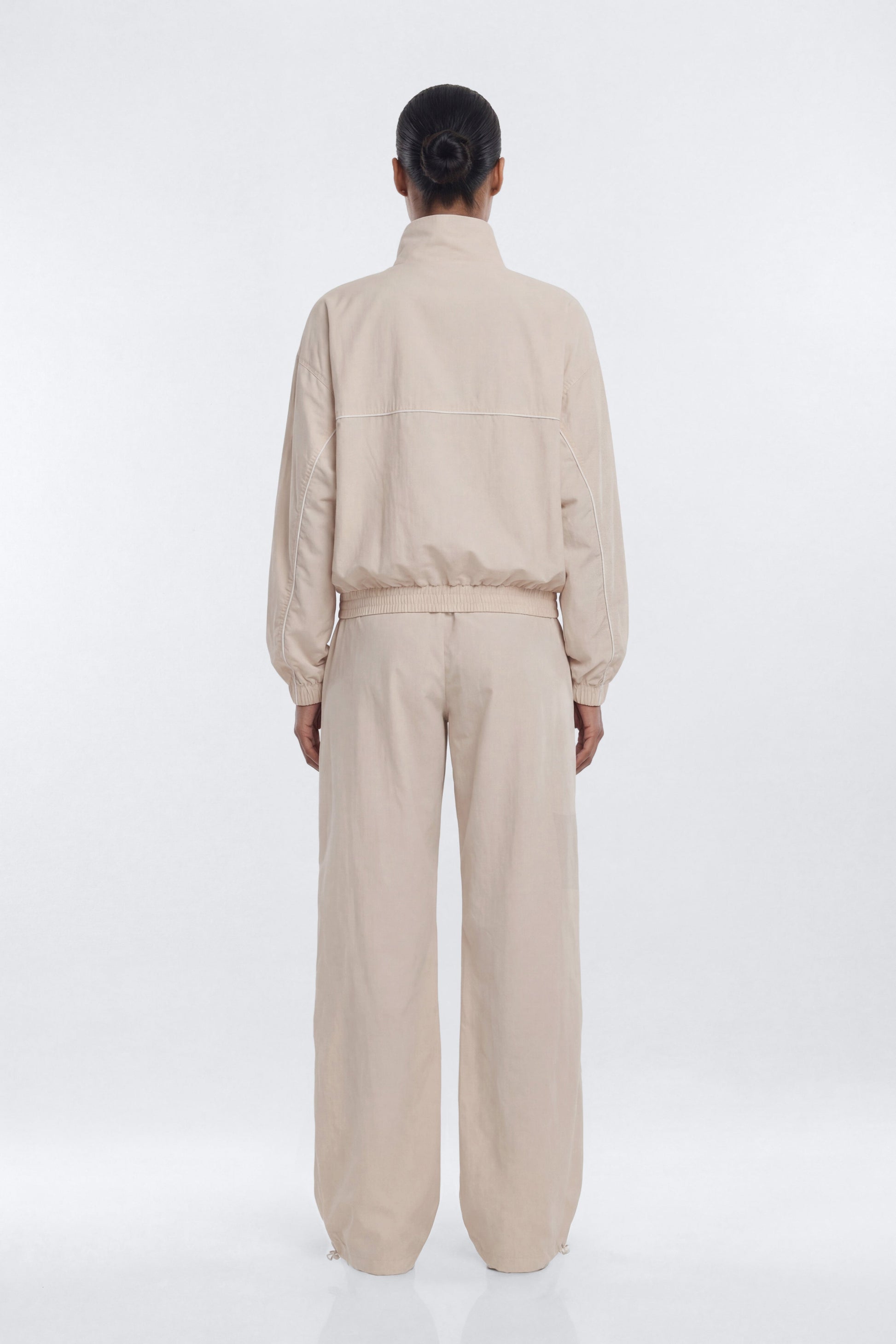 CoreNylon 32″ Pocket Track Pant - Oat Milk Fashion Nova