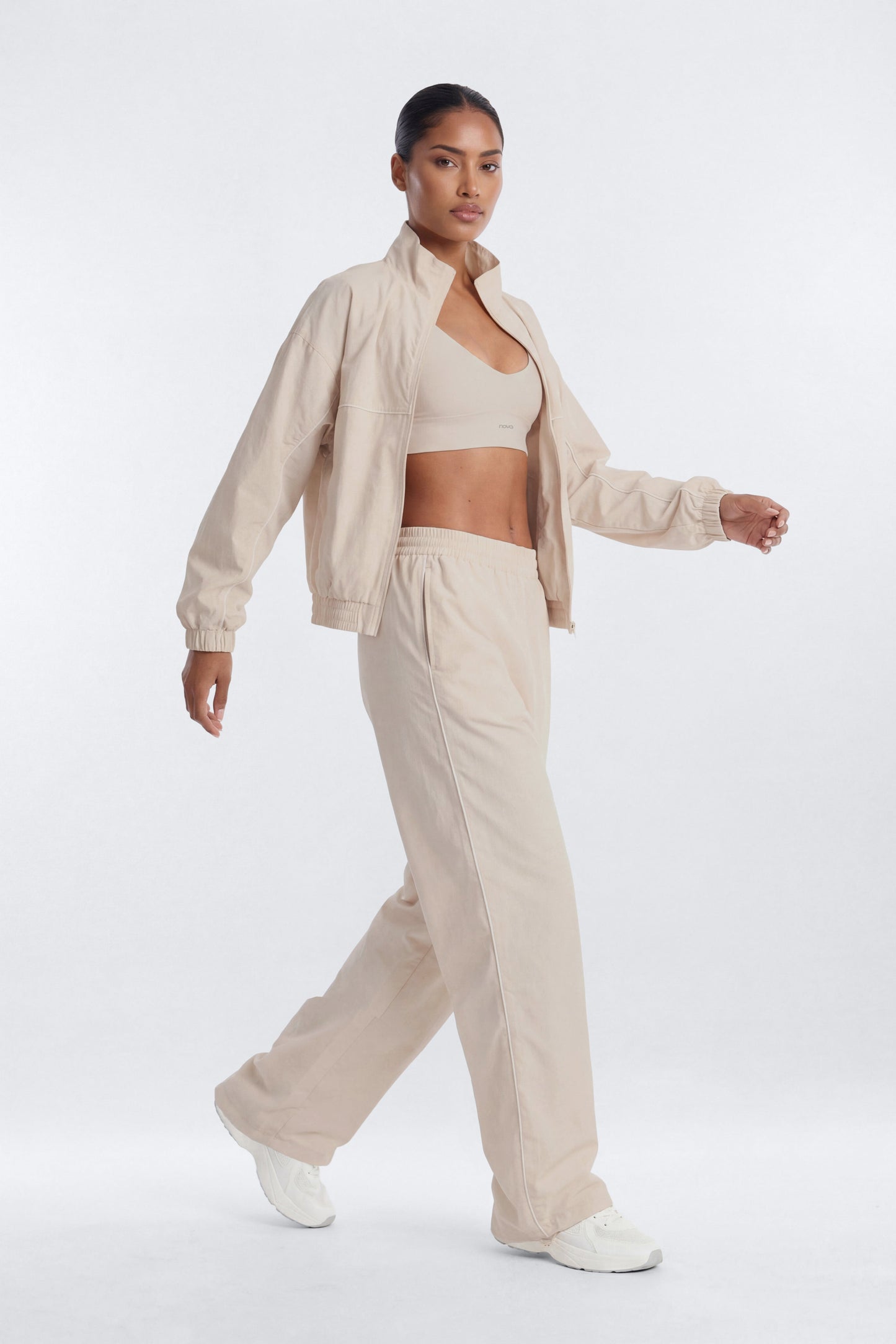 CoreNylon 32″ Pocket Track Pant - Oat Milk Fashion Nova